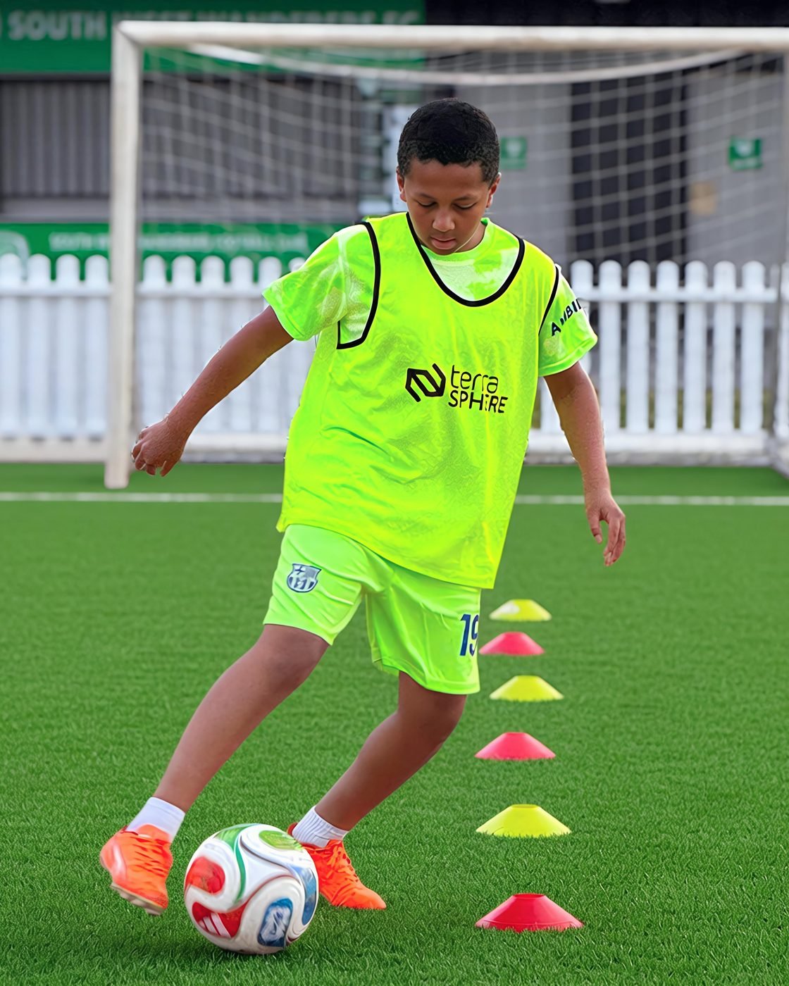 Player dribbling the ball during a training drill